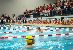 Spectators cheering at an ASU swimming event