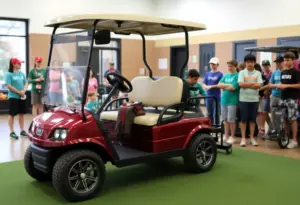 A custom golf cart for youth golf programs at a community center