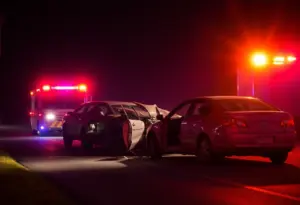 Emergency vehicles at the scene of a fatal crash in west Phoenix