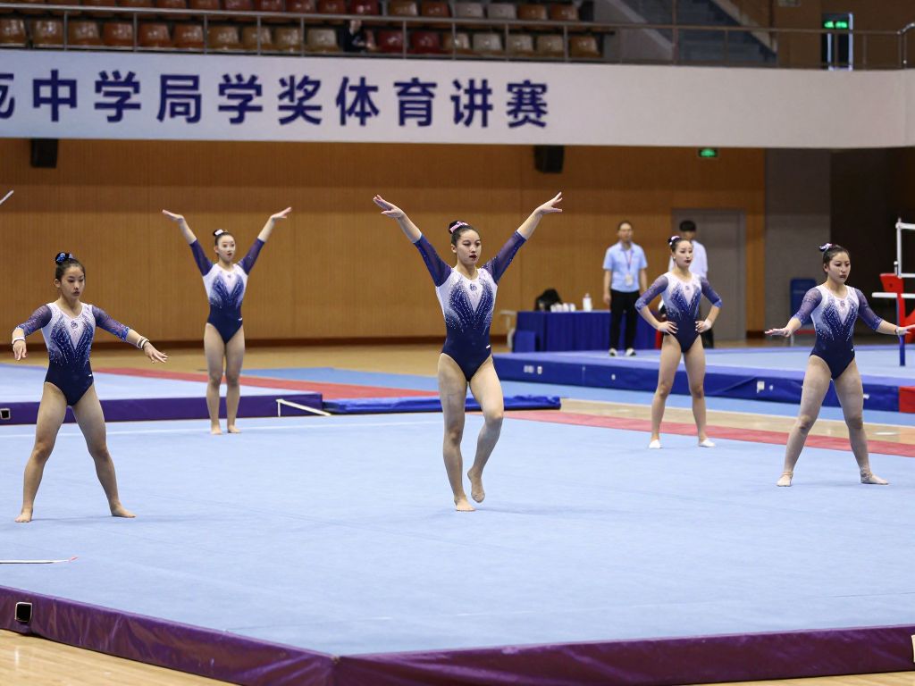 Arizona GymCats competing in a tri-meet against Denver and TWU