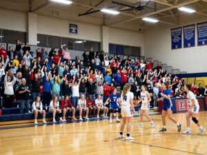 High school girls' basketball game between Eagles and Braves