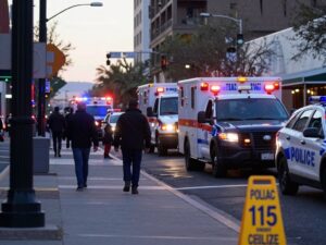 Emergency vehicles and police at a hit-and-run investigation site in East Phoenix