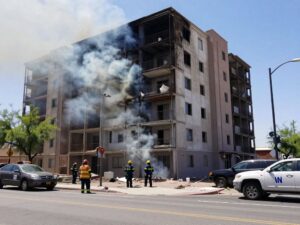 Smoke rising from an apartment building after a fire in Mesa, Arizona.