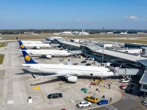 Aerial view of Mesa Gateway Airport with planes and terminal