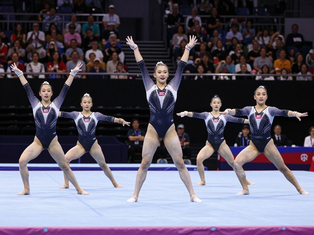 University of Arizona gymnastics team performing at a competition