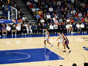 Yavapai College basketball teams competing on the court