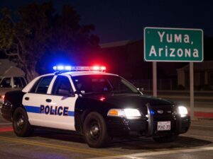 Police vehicle involved in a traffic stop at night in Yuma, Arizona