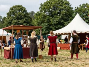 Colorful scene of the Arizona Renaissance Festival with costumes and crafts
