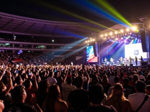 Crowd enjoying a live Fuerza Regida concert at Chase Field