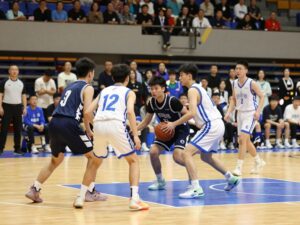 High school basketball players competing in a playoff game