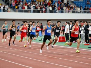 Students from NC Leadership and Phoenix Academy competing in an indoor track event