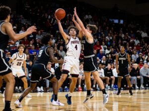 Players from Millennium High School celebrating their victory over Sunnyslope