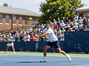 NAU men's tennis team competing in a match in Phoenix