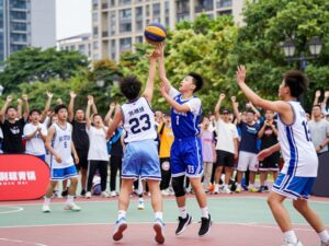 Participants playing basketball in a Phoenix tournament